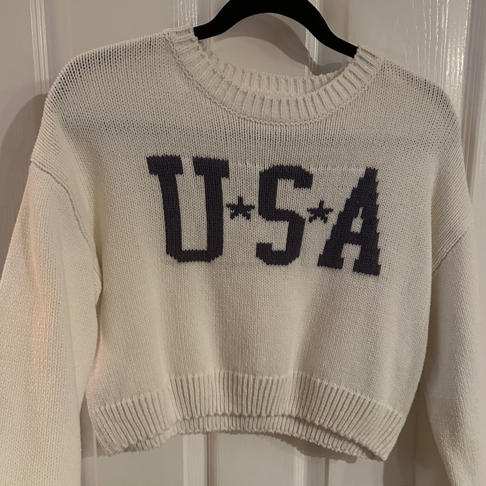 Perfect for 4th of July!
Greyson Threads 
USA White Sweater 
Size Medium
Cropped